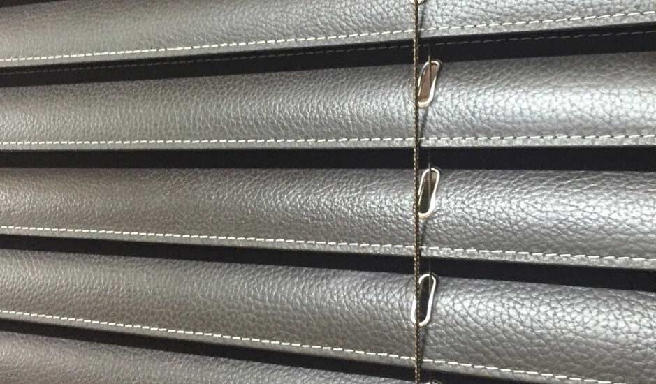 Dark grey leather ventian blinds