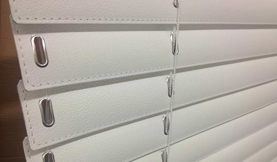 White leather venetian blinds