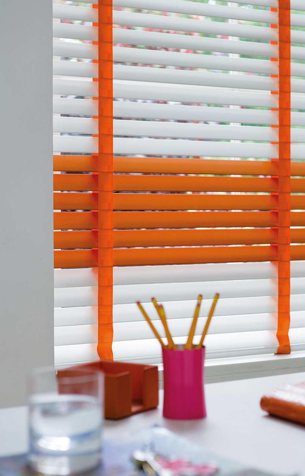 Bright venetian blinds in modern office