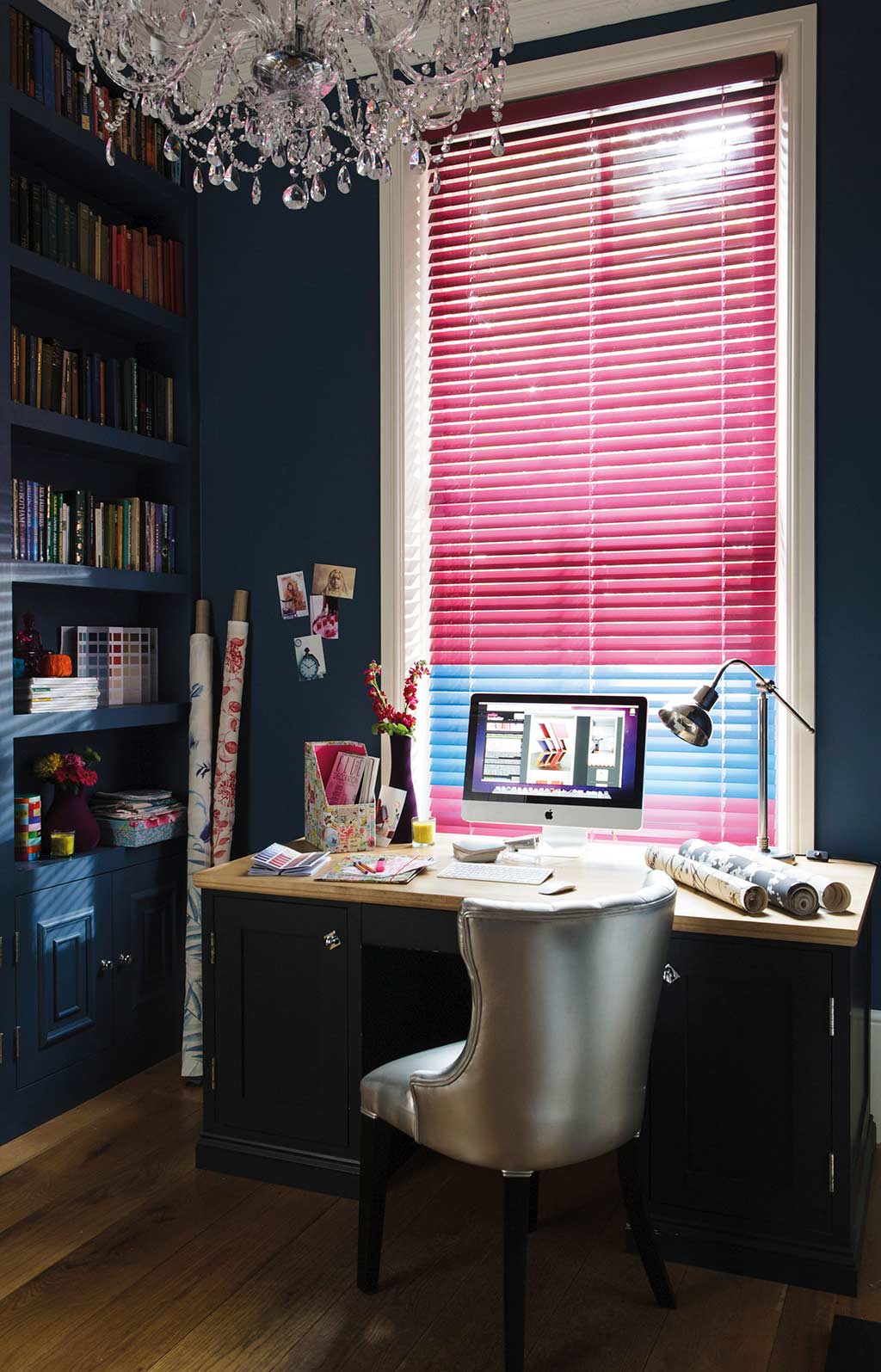 Bright pink venetian blinds in modern office